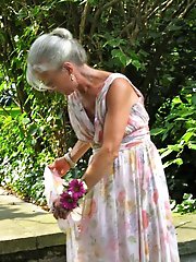 Desirable  mature woman is posing naked