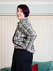 Naughty housewife stripping and teasing