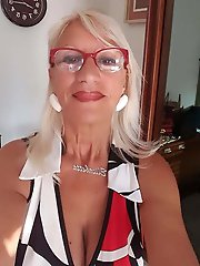 Ravishing lady is spreading her pussy lips on photo