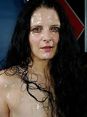 A brunette mother performs a flawless oral sex act during a gangbang