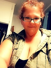 A collection of images featuring a voluptuous redhead with a curvy posterior